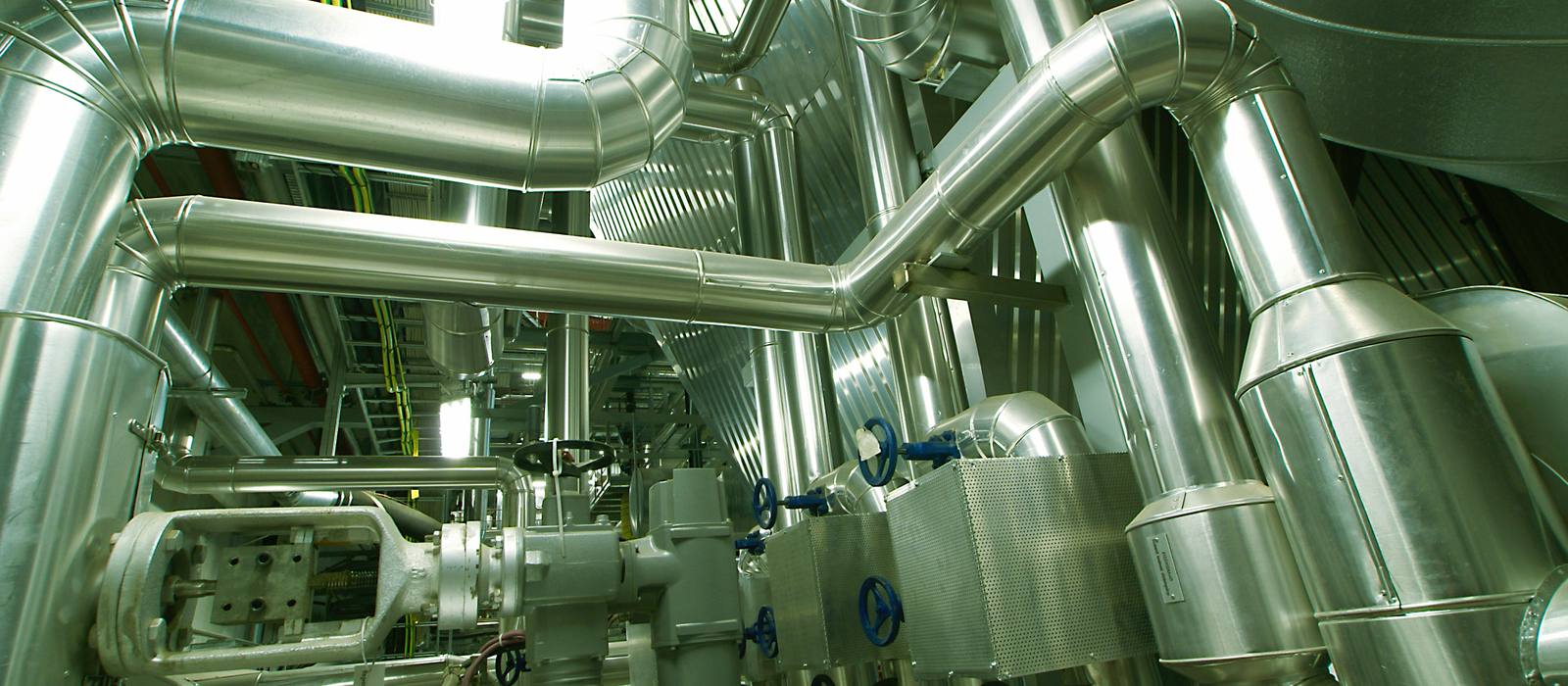 Insulated process pipework and valves in a chemical plant
