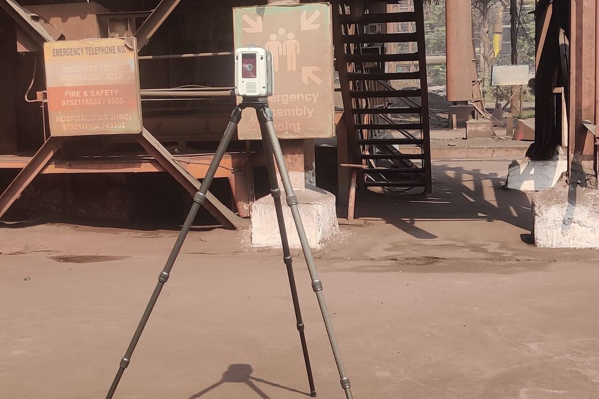 Leica laser scanner standing on a tripod at a scan position outdoors