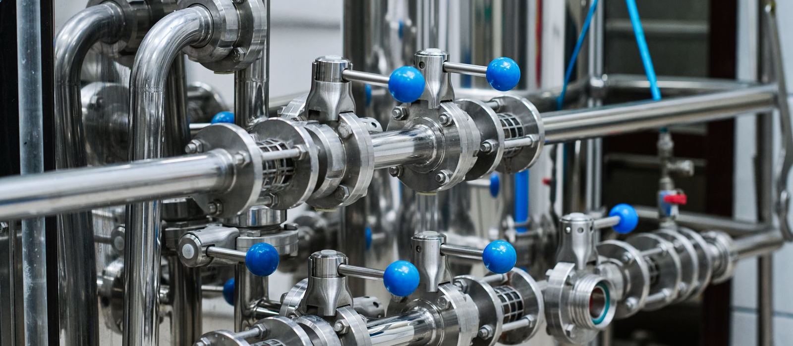Stainless steel process piping with valves in a pharma utility area